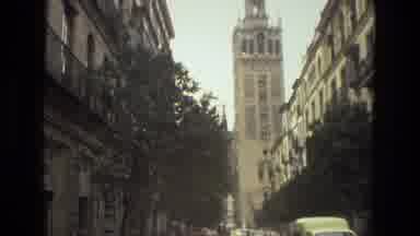 Madrid Spain (1978): A Old Monumental Tower On A Busy Street Of City