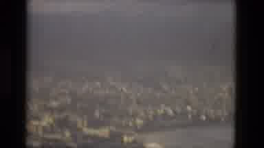 Barcelona Spain (1978): Plane Flying Land Water Clouds