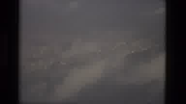 Barcelona Spain (1978): Aerial Clouds And City With Person Sitting On Bench Near