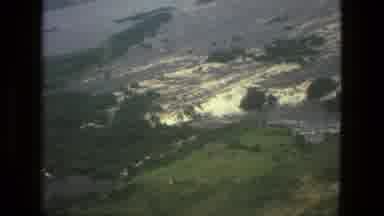 MANAUS BRAZIL-1979: Aerial Film Landscape Water High Flying Flood Clouds Overhead