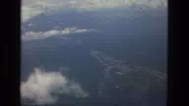 MANAUS BRAZIL-1979: Plane Explores Unexplored New Island Located In The Pacific
