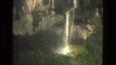 Manaus Brazil (1979): Very Large High Waterfalls Coming Down Off A Mountain As Sun