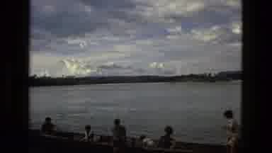 Manaus Brazil (1979): Six People On Canoe Boat In Water Relaxing During Day Time