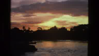 Manaus Brazil (1979): Two Friends In Front Of A Lake As The Sun Sets