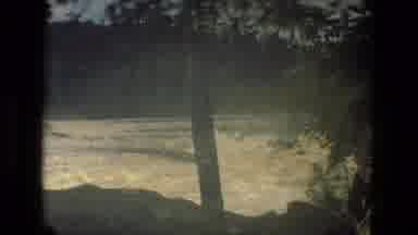 Manaus Brazil (1979): Man Walking Along The Bank Of A Very Full Roaring River