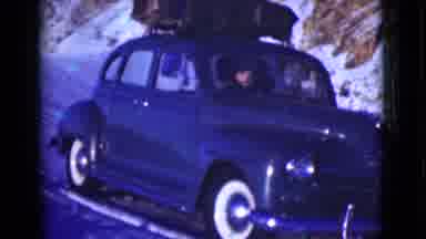 Alaska (1946): An Old Car Is Sitting In The Snow A Person Is Moving Inside