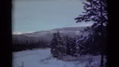Alaska (1946): Mountains Trees Blue Skies And White Clouds On A Beautiful Day