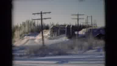 Alaska (1946): Winter Time Scenes With Trees Mountains Road With Tire Tracks In
