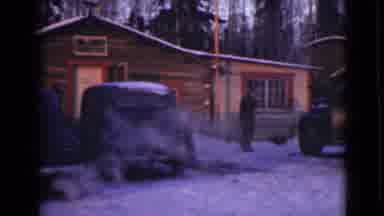 Alaska (1946): Pine Trees Surround This Cabin