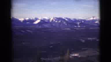 Alaska (1946): Mountains Valley Snow Open Green Trees