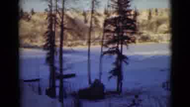 Alaska (1946): A Snow Covered Nature Scene At Peace River