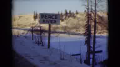 Alaska (1946): A Winter Scene With A Simple Sign That Says Peace River