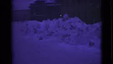 Alaska (1946): Massive Snow Drifts Along The Side Of A Road In Front Of Buildings