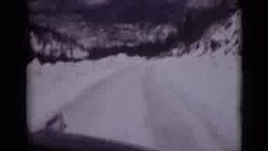 Alaska (1946): Driving Along A Snowy Road Then A Garage