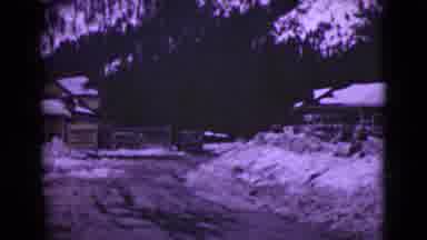 Alaska (1946): Bridge And Snow Covered Building On A Clear Winter Day