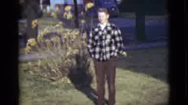 Alaska (1946): A Boy Wearing A Black White And Grey As Well As Brown Pants And