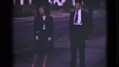 Alaska (1946): One Man And Lady Standing In The Side Of Road And Other Man And
