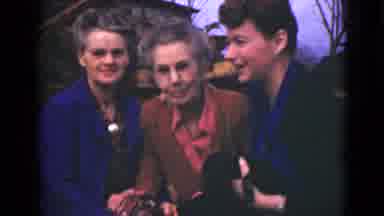 Alaska (1946): Three Old Women Are Holding A Animal In Outdoor