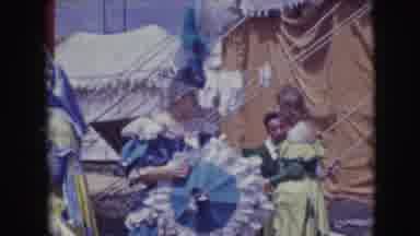 Ringling Brothers Sarasota Florida (1948): Woman Wearing Purple Dress Walks Past