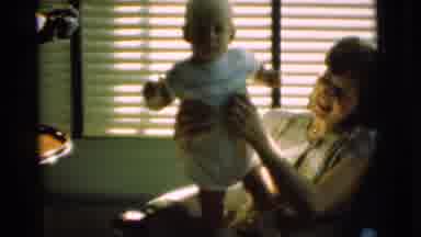 Chatham New Jersey (1951): A Mum Is Tickling The Baby Who Is Wearing A Bodysuit