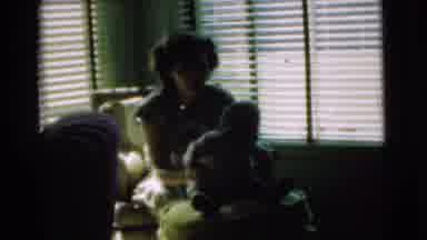 Chatham New Jersey (1951): Woman Playing With Child While Man Is Talking By The