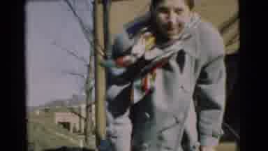 Chatham New Jersey (1951): A Lady Is Standing Outside On A Cold Windy Day With Her