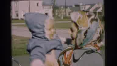 Chatham New Jersey (1951): Mother In Headscarf Bounces Hooded Baby In Blue Up And