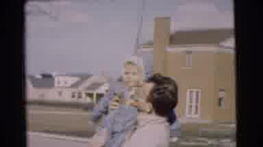 Chatham New Jersey (1951): Man Holding Child With Homes In Background