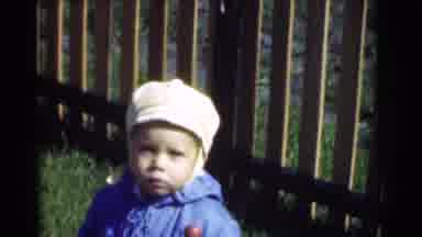 Chatham New Jersey (1951): A Child With A Blue Coat And White Hat Is Standing