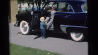 Chatham New Jersey (1951): A Small Toddler Approaches Its Mother In A Car And Is