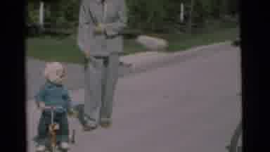 Coat and hat? This kid's got road safety... and a serious fashion crisis!