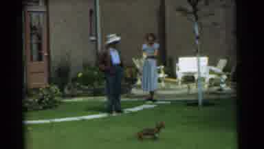 Chatham New Jersey (1951): A Man Woman And Child Walk Around The Garden With A
