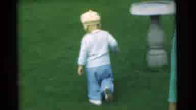 Chatham New Jersey (1951): A Toddler Boy Walks Across A Lawn With A Woman In A