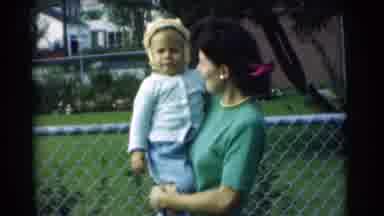Chatham New Jersey (1951): Mom Holding A Child Standing Behind A Chain Link Fence