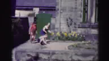 EDINBOURGH SCOTLAND-1952: Kids Playing Together In Their Yard