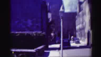 EDINBOURGH SCOTLAND-1952: Quiet Street With Vintage Cars And Stone Buildings