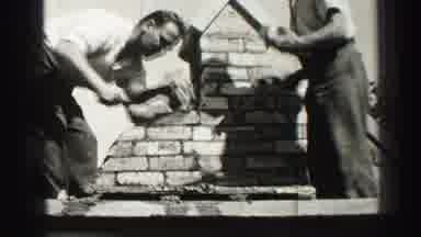 Edinbourgh Scotland (1952): Two Hard Working Men Laying Brick