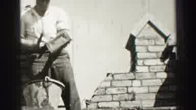 EDINBOURGH SCOTLAND-1952: Black And White Video Of Bricklayers Laying Bricks On Chimney