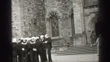 Edinbourgh Scotland (1952): A Group Of People Standing Outside A Church Praying In
