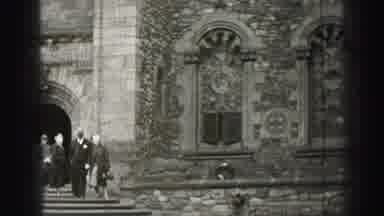 EDINBOURGH SCOTLAND-1952: Very Old Footage Of People Exiting A Large Medieval