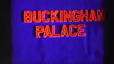 EDINBOURGH SCOTLAND-1952: Red Neon Sign Saying Buckingham Palace And The Palace Exterior