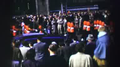 EDINBOURGH SCOTLAND-1952: Band Wearing Red And Black Marches In Parade On A