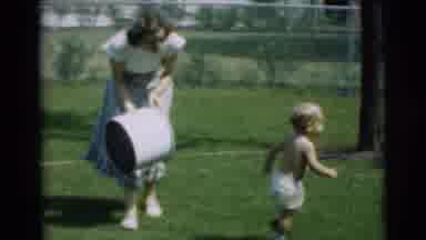 Pennington New Jersey (1954): Woman And Baby Outside In The Grass While Baby Walks