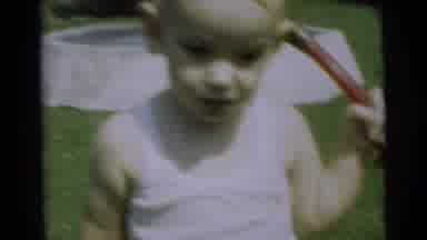 Pennington New Jersey (1954): Toddler Playing In The Yard With A Garden Hose And A