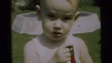 Pennington New Jersey (1954): Child Puts Hose In Mouth And Then Two Children Are