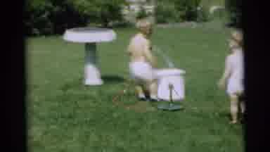 Pennington New Jersey (1954): Two Toddler Boys Play Outside With One Flowing Water