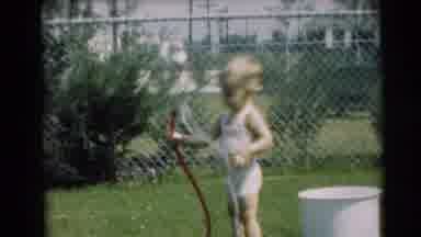 Pennington New Jersey (1954): Child Playing With A Hose
