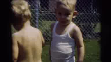 Pennington New Jersey (1954): Two Small Kids Are Playing With Water Pipe In Garden
