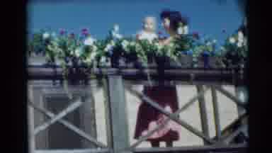 Pennington New Jersey (1954): Young Mother Holds Baby And The Baby Waves Then She