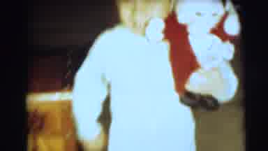 Pennington New Jersey (1954): Boy Wearing Blue Pajamas Runs Towards Camera Holding